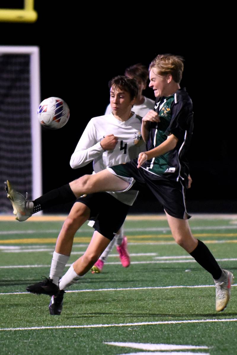 Coal City's Carter Hollis, right, kicks the ball away from Herscher's Owen Bollino during a game at Coal City Thursday, Oct. 2, 2025.