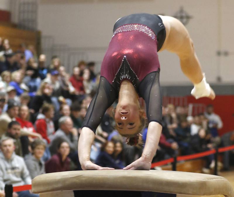 Prairie Ridge’s Thea Scheuer competes on the vault during the IHSA Mundelein Gymnastics Sectional on Feb. 13, 2025, at Mundelein High School.