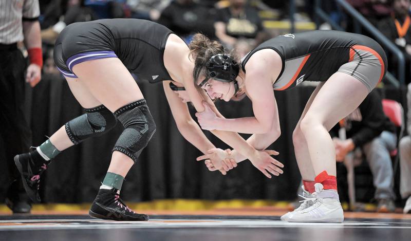 Kaneland’s Angelina Gochis controls Hampshire’s Amelia Nidelea-Polanin in the 120-pound class at the girls wrestling state finals tournament at Grossinger Arena in Bloomington on Saturday, Feb. 28, 2026.