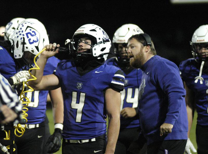Dixon's Landon Knigge grabs water during a timeout. Genoa-Kingston traveled to Dixon to take on the Dukes. The game took place on Dixon's Senior Night, October 24th, 2025
