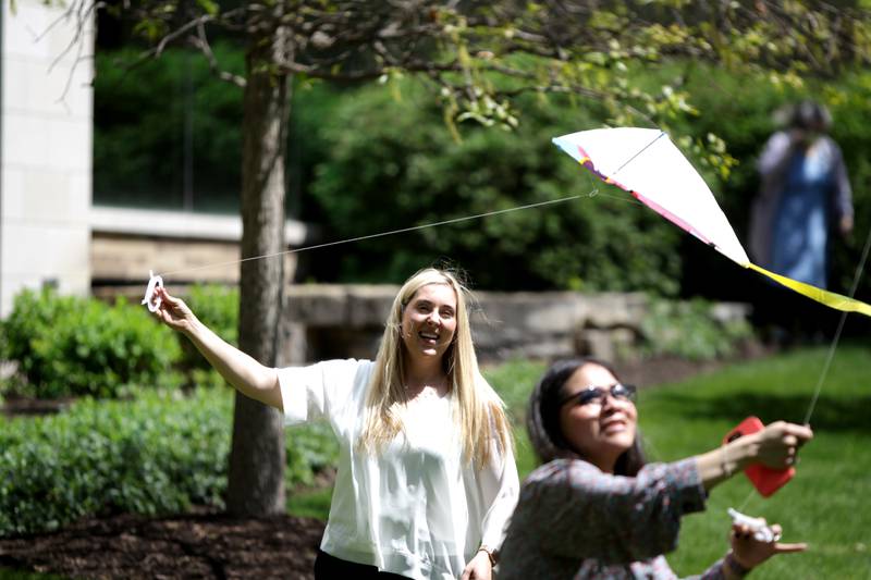 Nikki Warczak and Paola Ramos fly kites in the courtyard of Northwestern Medicine Central DuPage Hospital in Winfield as part of National Nurses’ Week festivities on Wednesday, May 10, 2023.