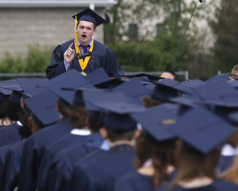 Sawyer Brashear speaks to his fellow graduates during the graduation ceremony for the class of 2023 at Cary-Grove High School in Cary.