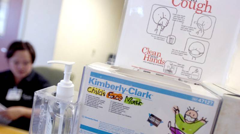 Anti-bacterial hand soap and face masks are available in several locations, including the entrance to the emergency room, at Delnor Hospital in Geneva. The hospital had to install more soap machines in light of the swine flu.