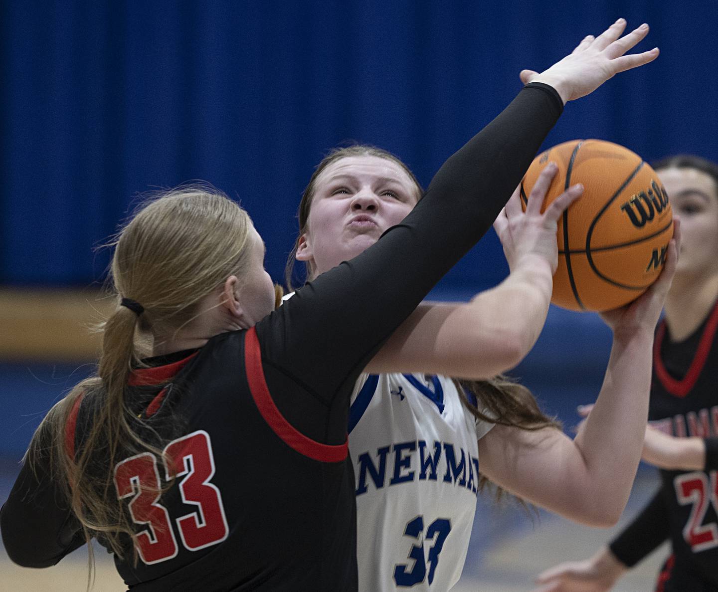 Newman’s Veronica Haley puts up a shot against Stillman Valley’s Chloe Stienmetz Monday, Feb. 2, 2026.