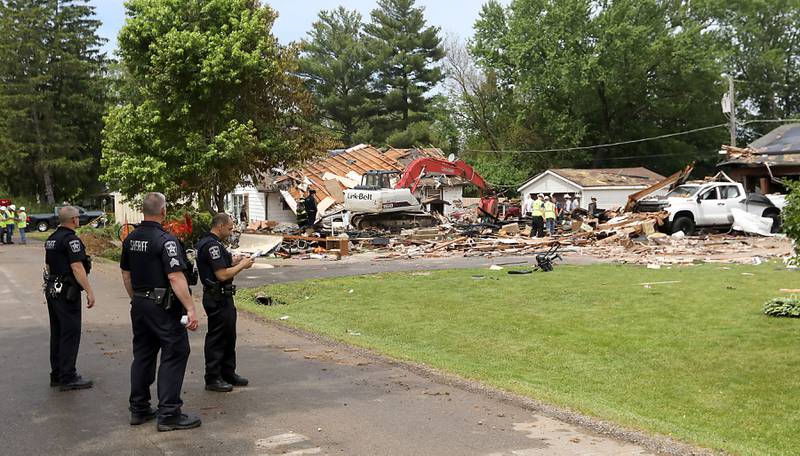 Authorities look for the cause of a home explosion on Monday, May 18, 2026, in 7400 block of Birch Drive, in Wonder Lake, after the Sunday evening explosion. One resident of a home was killed and two others have been taken to the hospital.