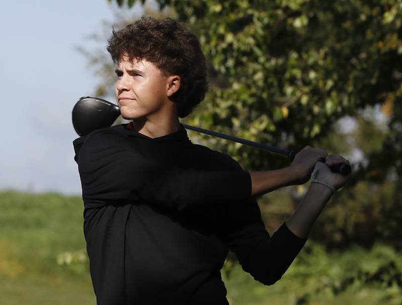 Crystal Lake Central’s Asher Johnson watches his tee shot on the 6th hole during the Fox Valley Conference Boys Golf Tournament Thursday, Sept. 25, 2025, at Foxford Hills Golf Club in Cary.