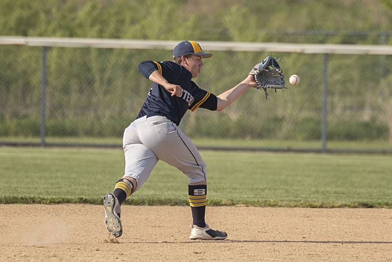Sterling’s Drew Nettleton gets a glove on a hot shot at third base against Rochelle in class 3A regional action on Monday, May 22, 2023.