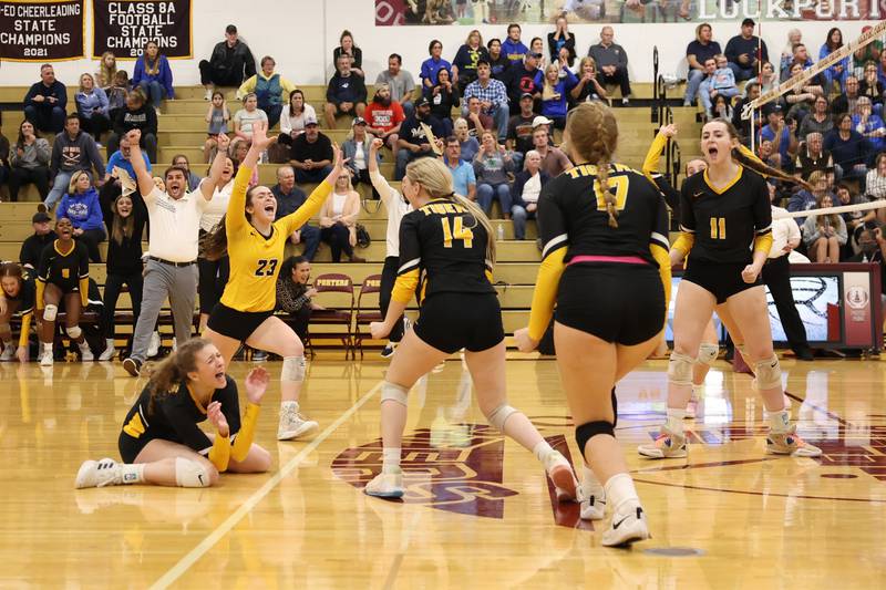 Joliet West celebrates match point against Sandburg in the in the Class 4A Lockport Sectional title match on Wednesday.