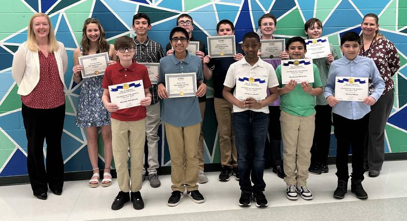 The Troy Community School District 30-C school board recognized its February 2022 Students of the Month at the district’s March school board meeting. Pictured are, top from left: William B. Orenic Intermediate School Principal Kelly Landers, Ava Gombosi, Ian Torres, Joseph Caucci, Wyatt Gottner, Alexander Brtva, Aiden Bowden and Troy Middle School Assistant Principal Liz D’Andrea; and bottom from left: Keane Newman, Omar Silva, Jaden Lanier, Marcos Montes and David Meza, a November 2021 Student of the Month.
