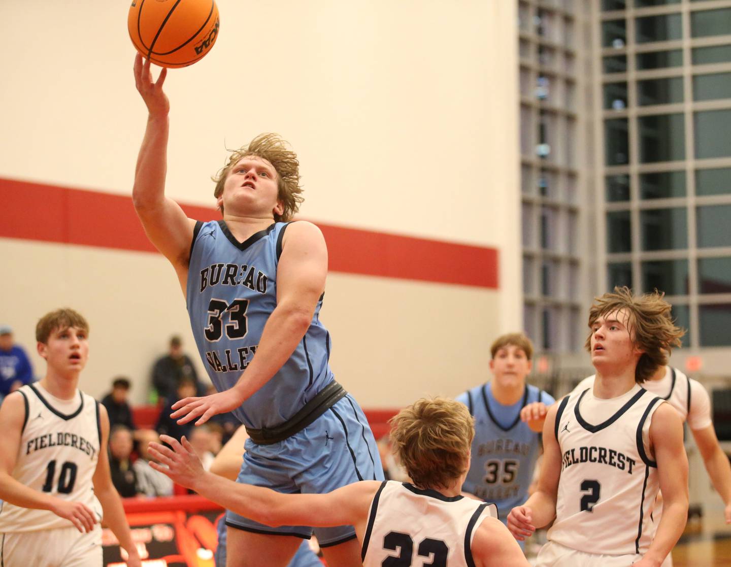 Bureau Valley's Elijah Endress drives to the basket against Fieldcrest during the 50th annual Colmone Classic on Monday, Dec. 9, 2024 at Hall High School.