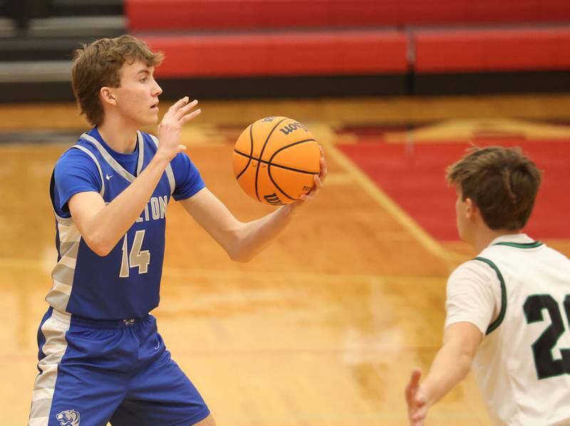 Princeton's Jackson Mason looks to pass the ball around Eureka's Jacob Schultz during the Colmone Classic on Thursday, Dec. 11, 2025 at Hall High School.