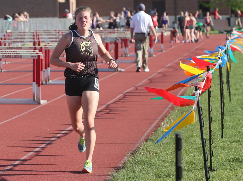 Sycamore's Carly Carpenter runs in the 3200 meter race during the Interstate 8 conference track meet on Friday, May 3, 2024 at the L-P Athletic Complex in La Salle.