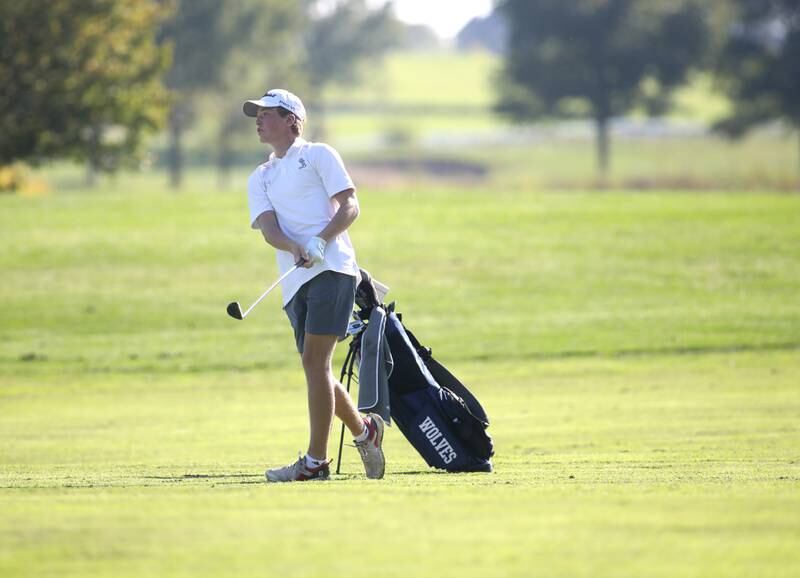 Oswego East’s Zach Johnson hits from the fairway during the Class 3A Plainfield North Boys Golf Sectional at Whitetail Ridge Golf Course in Yorkville on Monday, Oct. 2, 2023.