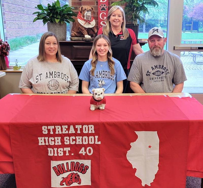 Recent Streator graduate and Times All-Area Girls Volleyball honoree Emma Rambo has decided to continue her education at St. Ambrose University in Davenport, Iowa, and her volleyball career at the NAIA level with the Fighting Bees. Emma (seated at center) is pictured here bookended by her parents, Allyson and Craig, with Streator volleyball coach Julie Gabehart standing behind.