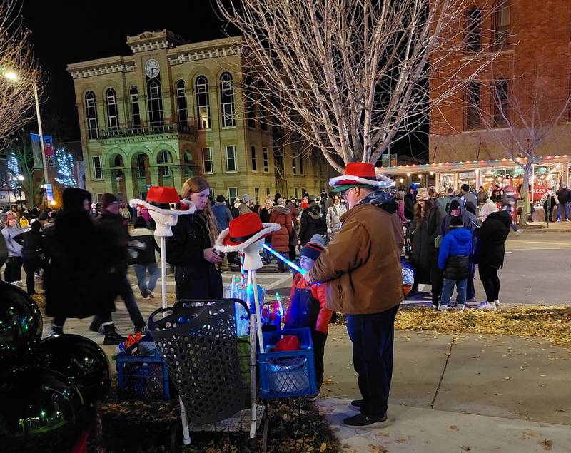 A vendor sells glow sticks Friday, Nov. 24, 2023, during the Festival of Lights in Ottawa.