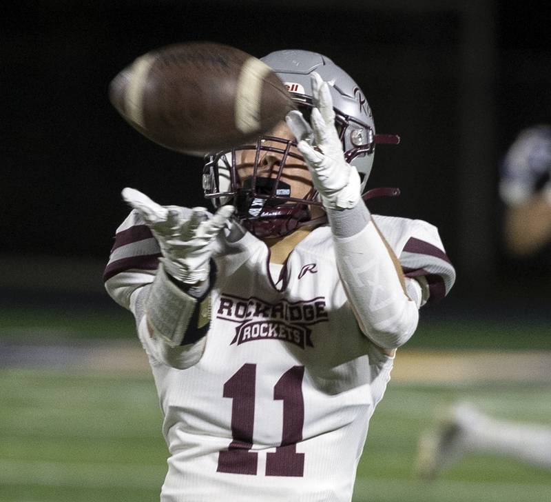 Rockridge’s Chase Wheatley hauls in a pass against Newman Friday, Sept. 27, 2024, in Sterling.
