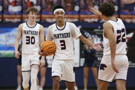 Photos: Oswego vs. Oswego East boys basketball
