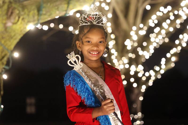 Reyna Slater, age 7, who recently won the 2023 Little Miss Black Joliet poses for a photo on Tuesday, Dec 5, 2023. The pageant was an annual event until 2008 and was revived this year