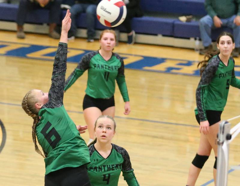 Leland's Macey Kinnery spikes the ball to Earlville during the Class 1A Regional semifinals on Monday, Oct. 27, 2025 at Somonauk High School.