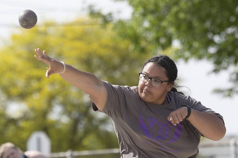 Dixon’s Tya Collins fires off the shot put Thursday, May 11, 2023 at the class 2A Sterling girls track sectionals.