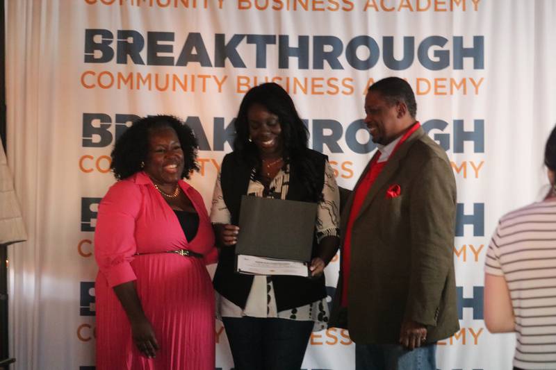 (Left to right) Danita Sims, Michelle Crayton and Glenn Roby pose for a picture Jan. 18, 2025, during a graduation ceremony to commemorate the inaugural cohort on completing the Breakthrough Community Business Academy.