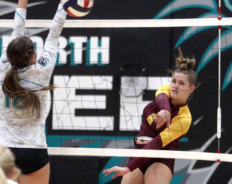 Richmond-Burton’s Elissa Furlan sends the ball over the net in varsity volleyball at Woodstock North Monday night.