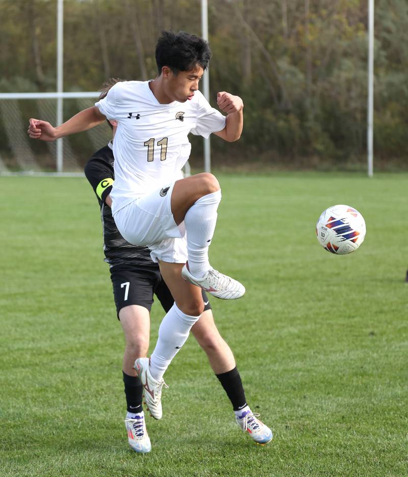 Sycamore's Chandler Gatbunton kicks the ball in front of Kaneland's Cameron Guernon during their game Monday, Oct. 7, 2024, at Kaneland High School in Maple Park.
