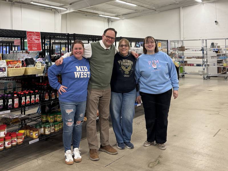 We Care of Grundy County employees Lindsey Cote, Executive Director Eric Fisher, Wendy Mulderink, and Gillian Doran.