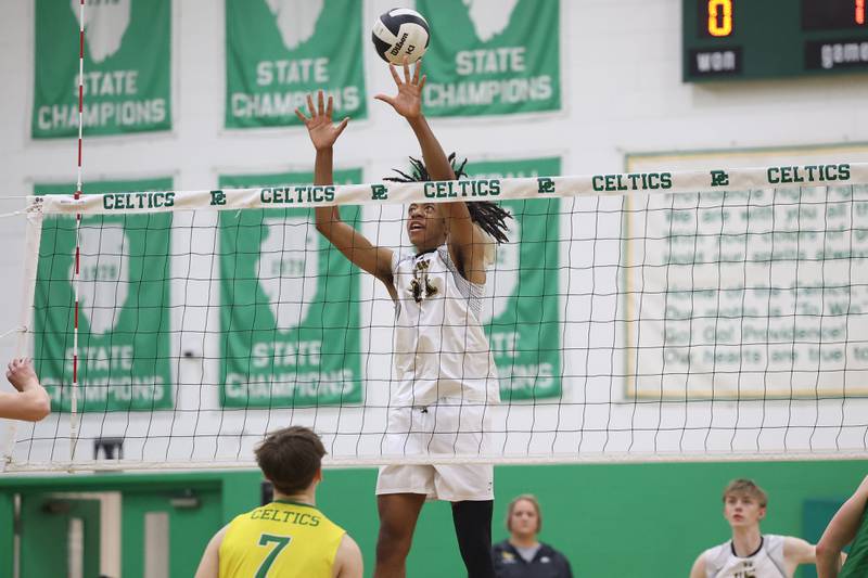 Joliet West’s Drew Johnson goes for the block against Providence on Tuesday, April 16, 2024 in New Lenox.