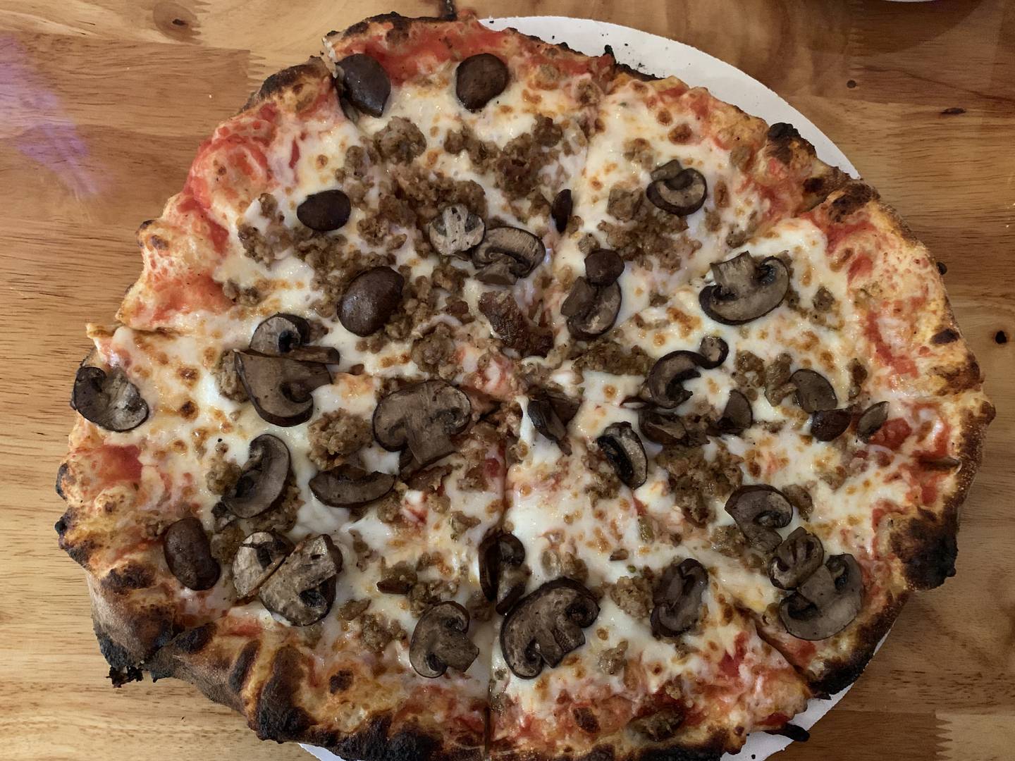 Your Sister’s Tomato makes a Neapolitan style pie with homemade dough, hand crushed San Marzano tomato sauce and topped with your favorite ingredients.