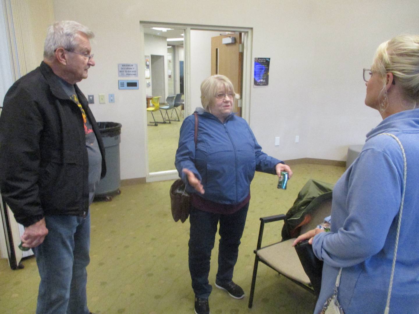 Wayne and Gloria Kassel of Joliet talk with nurse Beth Corsetti after a town hall meeting Wednesday on changes at Saint Joseph Medical Center since Prime Healthcare took ownership on March 1. May 21, 2025