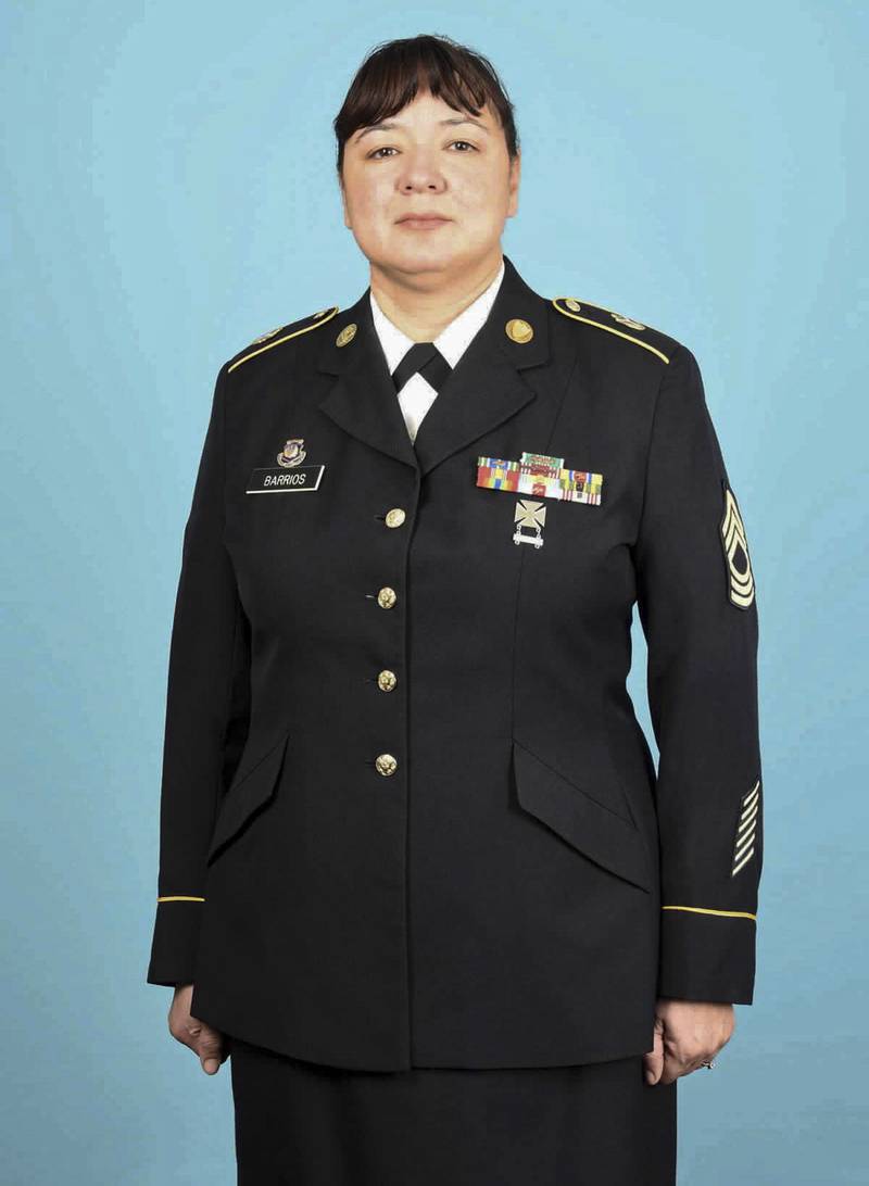 Master Sgt. Thelma Barrios, brigade senior human resource noncommissioned officer for the 108th Sustainment Brigade, stands at the position of attention while taking an official Department of the Army photo. Barrios was selected as a national 2022 Latina Style Distinguished Military Service Award recipient – one of only 21 service members selected for the honor this year.