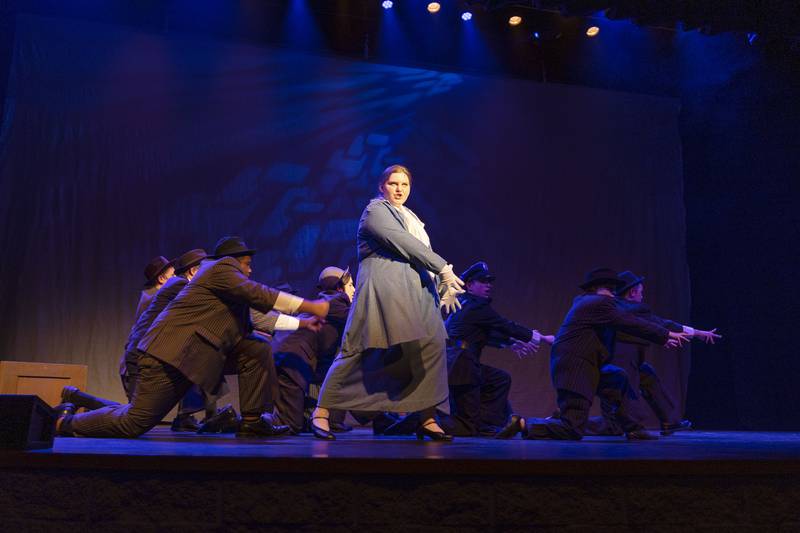 Anna Hutchinson, playing Duchess Estonia Dulworth, leads her vice squad in a song during rehearsal of Sterling High School’s “Nice Work…If You Can Get It,” Thursday, Feb. 23, 2023.