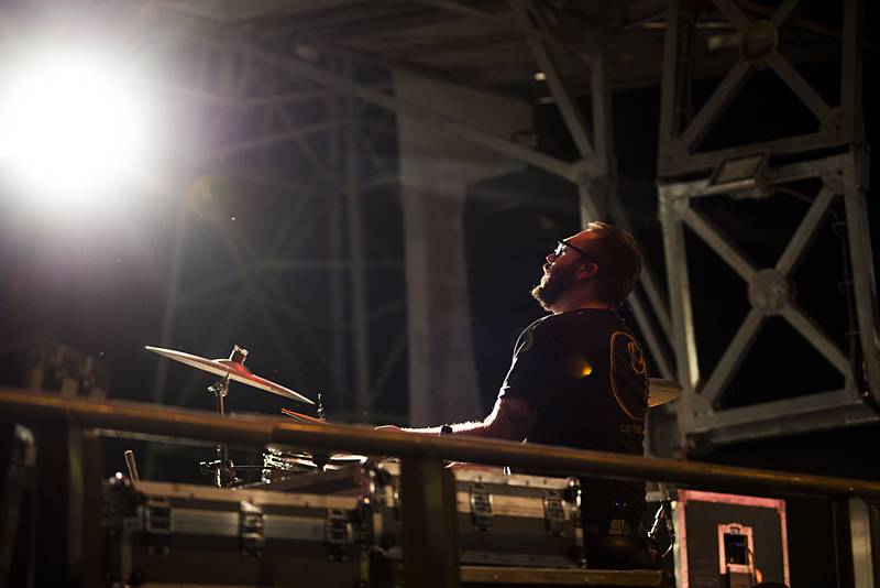 The drummer for Travis Denning hammers the skins near the end of the set Friday, July 1, 2022 at Dixon’s Petunia Fest.