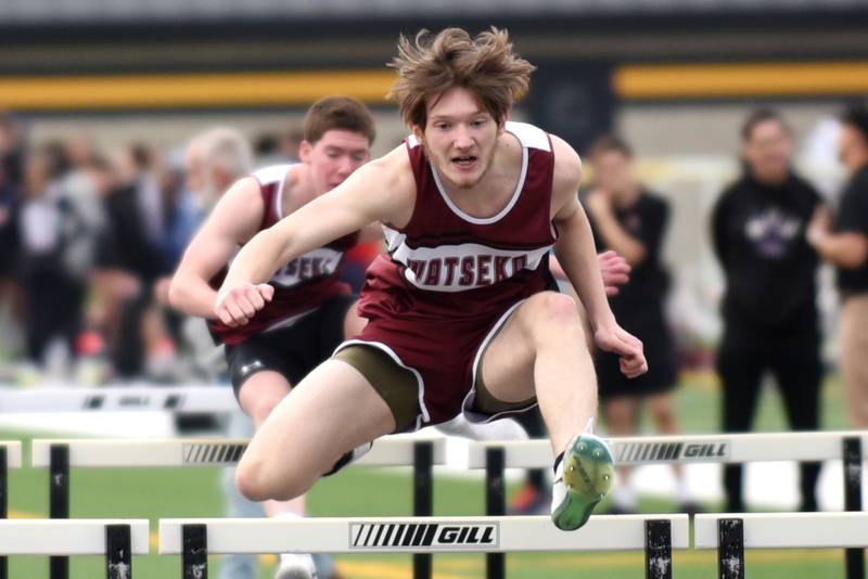 Watseka's CJ Murray leaps over the final hurdle of the 110 m hurdles at the Herscher Invite Friday, May 2, 2025.