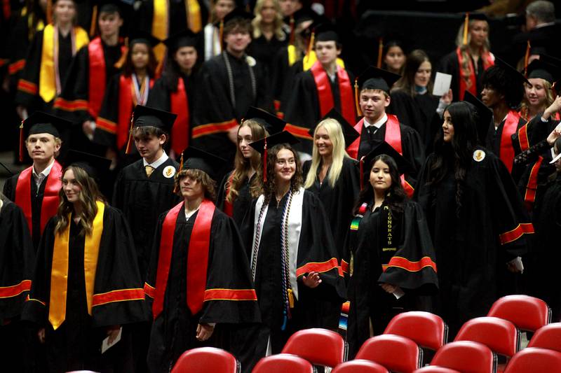 Batavia High School graduates enter the auditorium for the school’s 2025 commencement ceremony on Wednesday, May 21, 2025 at Northern Illinois University in DeKalb.
