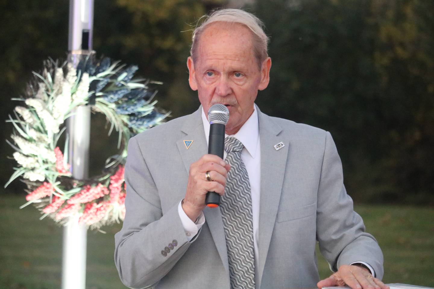 Local U.S. Air Force veteran Michael Embrey hosts a rededication ceremony Oct. 20, 2023 for the DeKalb Veterans Memorial outside the DeKalb Elks Lodge in DeKalb.