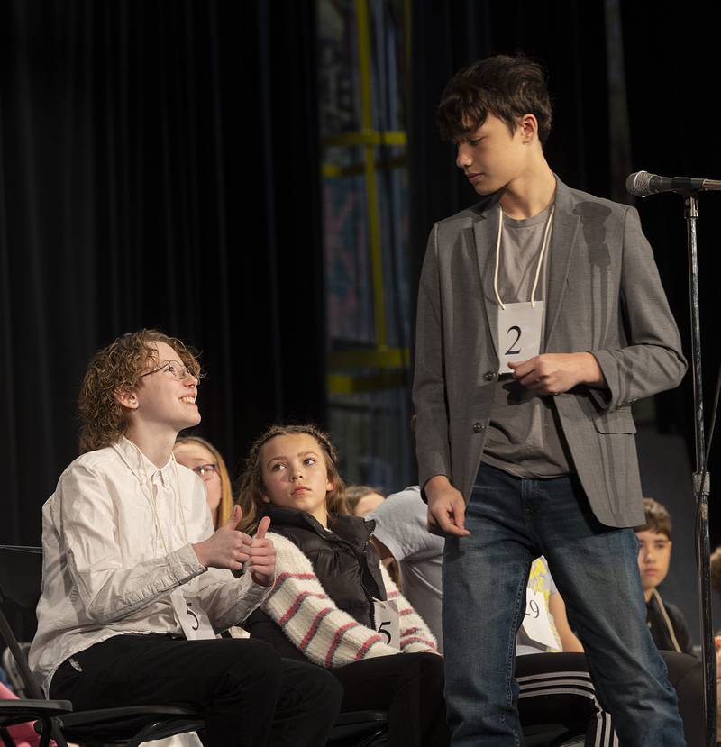 Jake Andrzejewski (left) celebrates a correct word with spelling bee comrade Jackson Melton Thursday, Feb. 21, 2024 at the Lee-Ogle-Whiteside regional spelling bee. Melton, who came in as runner-up, missed on the word “theorem” in round thirteen.