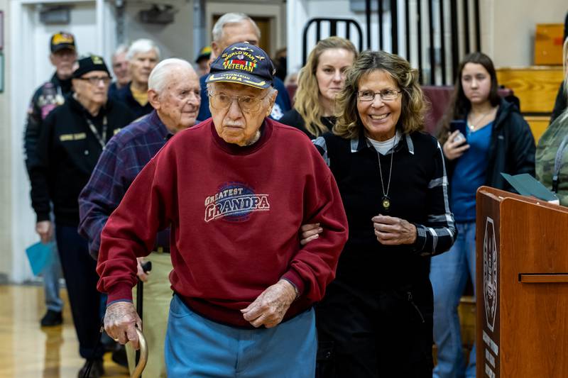 Veterans Ted Micci and Veronica Konow are recognized during Lockport Township High School’s 11th Annual Veteran Night Celebration Ceremony on Jan. 23, 2026.
