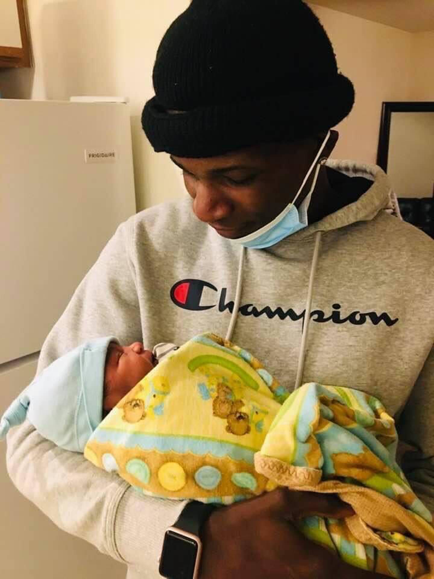 Marlon King Jr., a 2022 DeKalb High School graduate, holds his newborn daughter, Ari, in fall 2020. King was fatally shot May 11, 2023 in DeKalb. Two men, Jayden C. Hernandez and Carreon S. Scott, also of DeKalb, are charged with first-degree murder in his death.