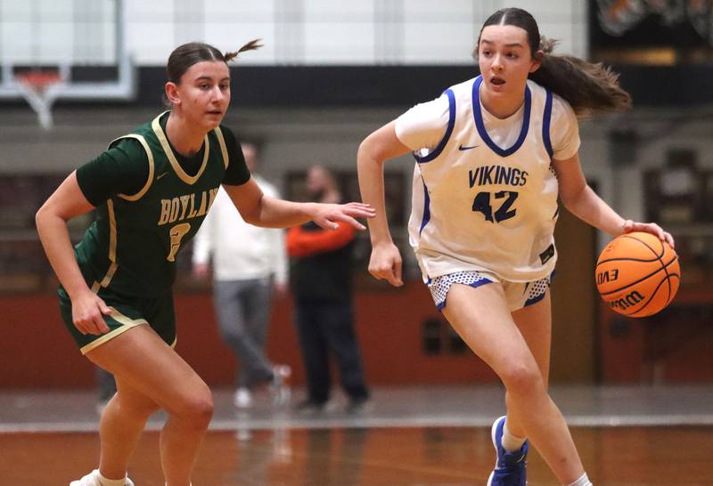 Geneva’s Adelyn Estabrook, right, moves the ball against Boylan in girls IHSA Class 3A Sectional basketball on Tuesday, Feb. 24, 2026, at Crystal Lake Central High School in Crystal Lake.