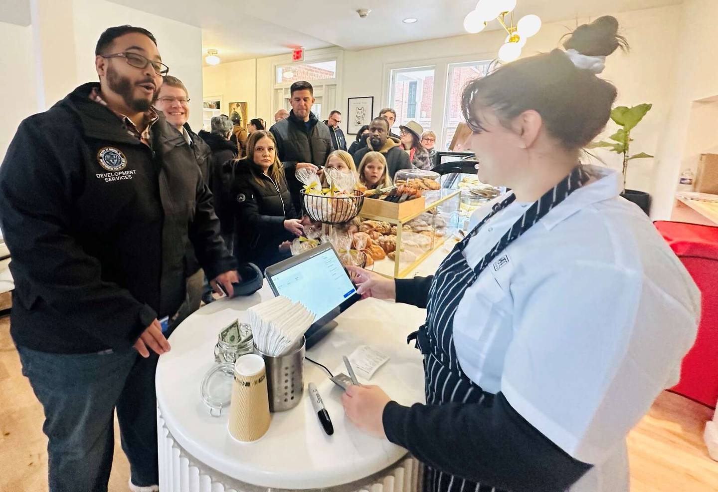 Customers place their orders Monday at the new Atrevete Café 1888 at 504 S. Lincoln Ave. in Aurora.