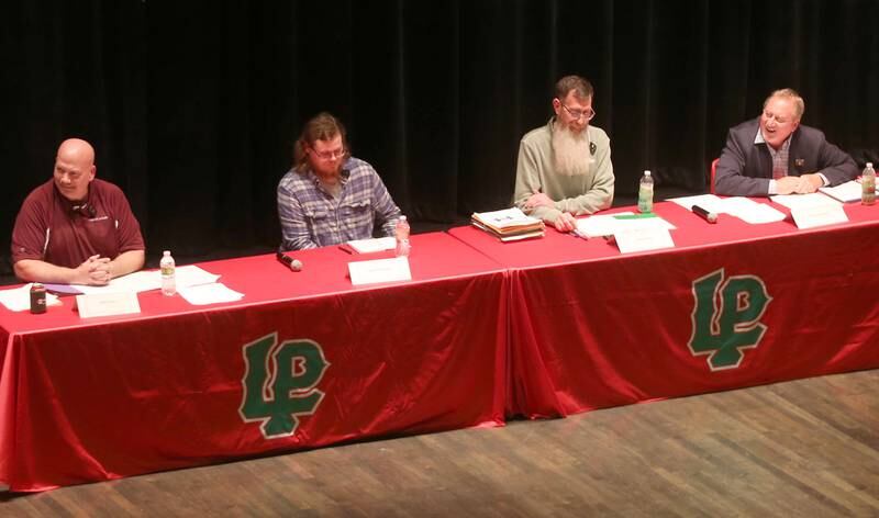 La Salle mayor candidates (from left) Jeff Grove, Tyler Thompson, Jamie Hicks and Gary Hammers speak during the La Salle Mayor Forum on Wednesday, March 19, 2025 in Matthiessen Auditorium at La Salle-Peru Township High School.