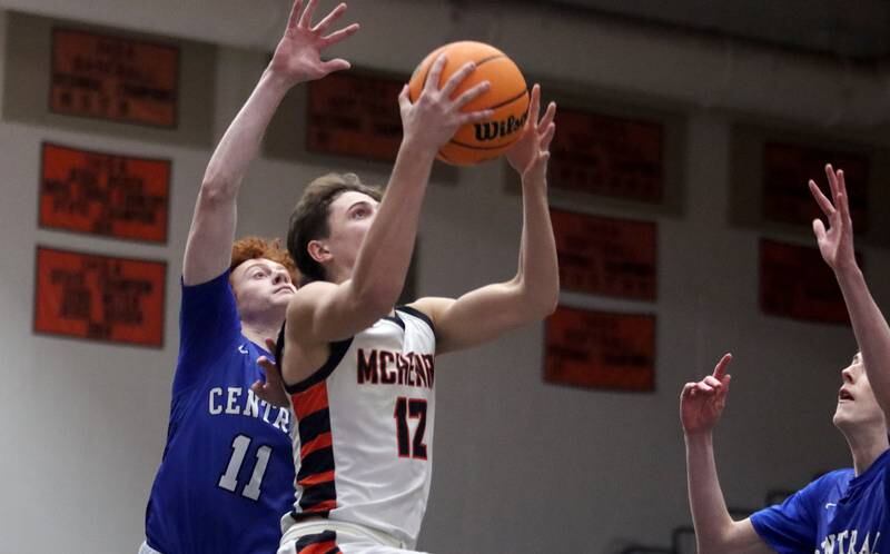McHenry’s Caleb Jett gets past Burlington Central’s Patrick Shell in varsity boys basketball on Tuesday, Feb. 4, 2025, at  McHenry High School  in McHenry.