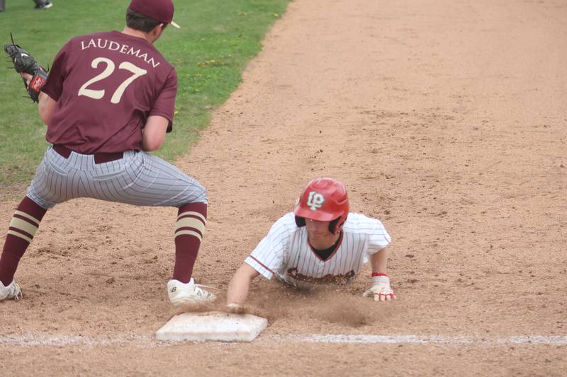 L-P's John Sowers gets back to first base as Moris's Cade Laudeman misses the tag on Friday, April 17, 2026 at Huby Sarver Field in the L-P Athletic Complex in La Salle.
