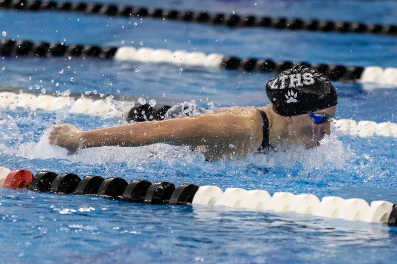 Lyons’s Maeve Collins competes in the 100 Yard Butterfly during the IHSA Girls State Swimming Preliminaries at FMC Natatorium in Westmont on Nov. 14, 2025.