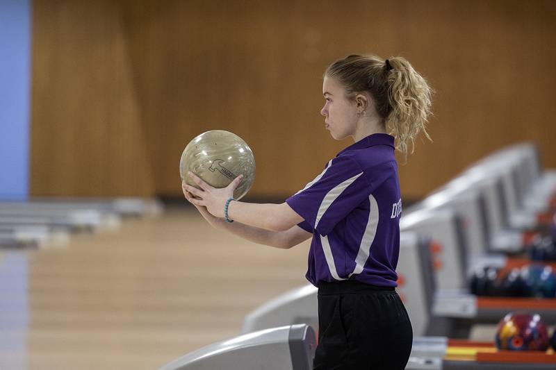 Dixon’s Autumn Swift concentrates on her throw during bowling regionals at Plum Hollow in Dixon on Saturday, Feb. 4, 2023.