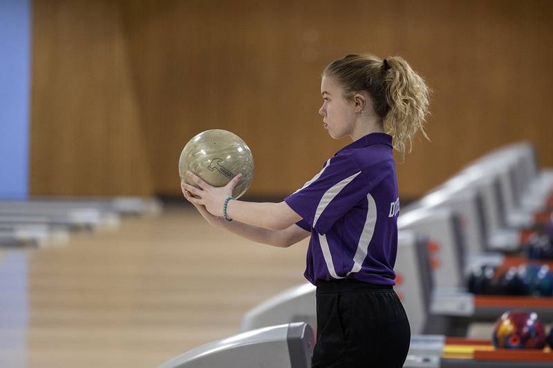 Dixon’s Autumn Swift concentrates on her throw during bowling regionals at Plum Hollow in Dixon on Saturday, Feb. 4, 2023.