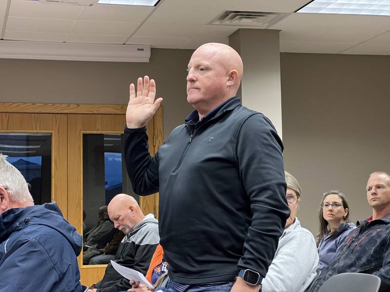 Brain Grainger is sworn in before his public comment at a Sycamore Planning and Zoning Commission meeting on Monday, Oct. 14, 2024. He asked for, and received, the commission's recommendation for approval of his tweaked plans for the second phase of the Old Mill Park 55-and-older living community in Sycamore.