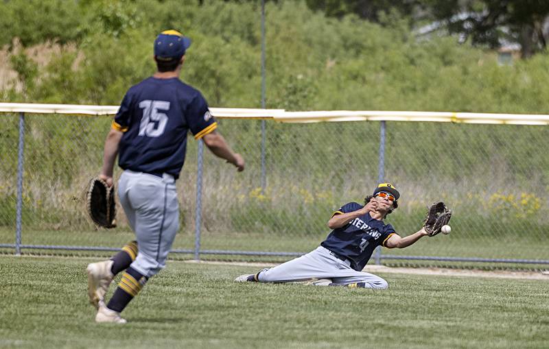 Sterling’s Gio Cantu slides but can not make the catch against Burlington Central during a class 3A regional final in Rochelle Saturday, May 27, 2023.